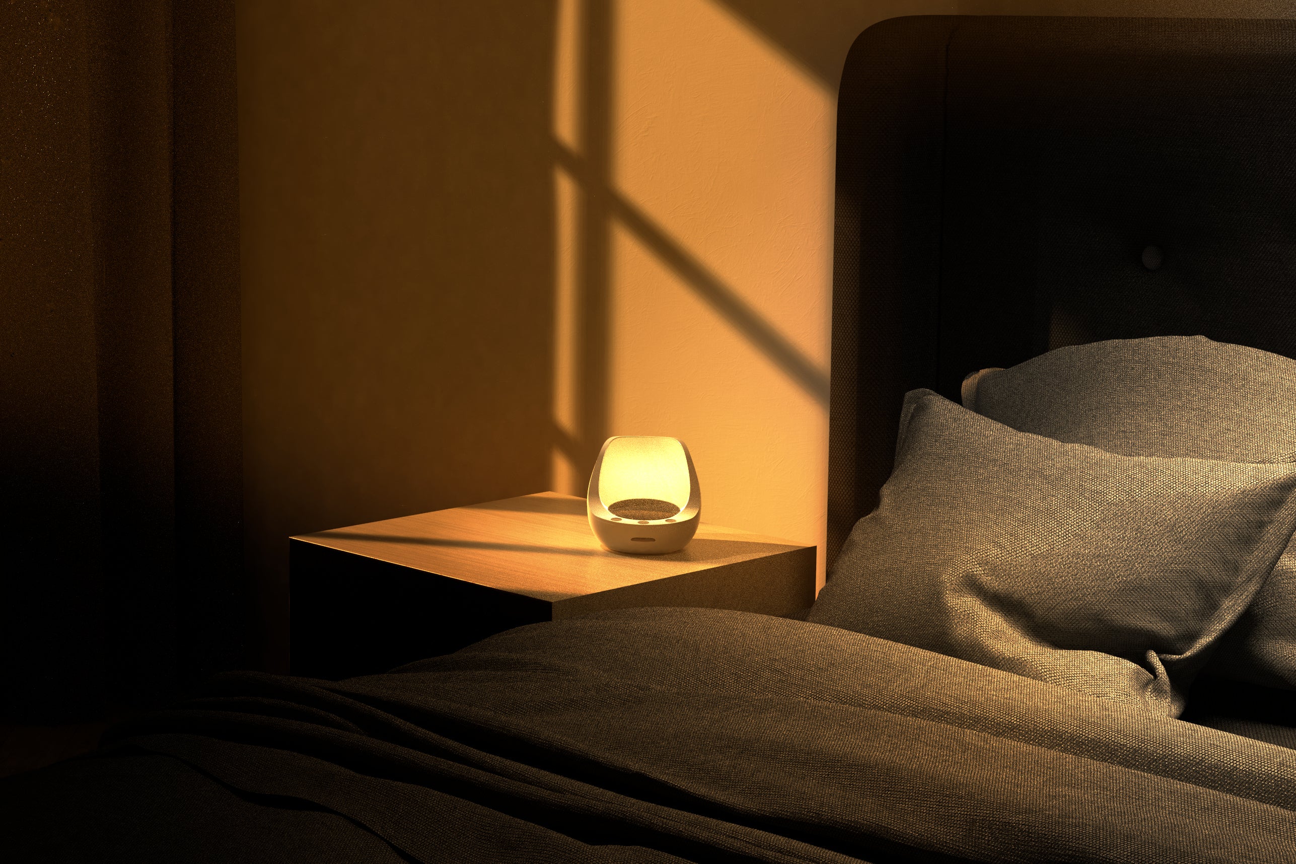 Oppvåkningslyset lyser på søvnklokken som står i et mørkt rom